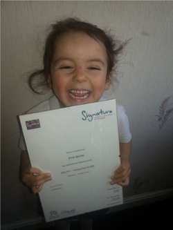 Evie Gavin with her certificate