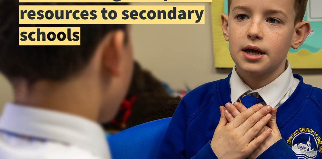 An image of children in a sign language lesson, captioned with the headline text of this article